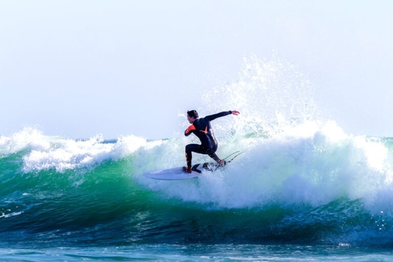 Surfer riding a wave in the Algarve