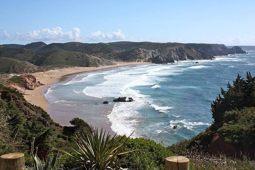 Wide sandy beach break at Amado near Carrapateira on the Algarve west coast