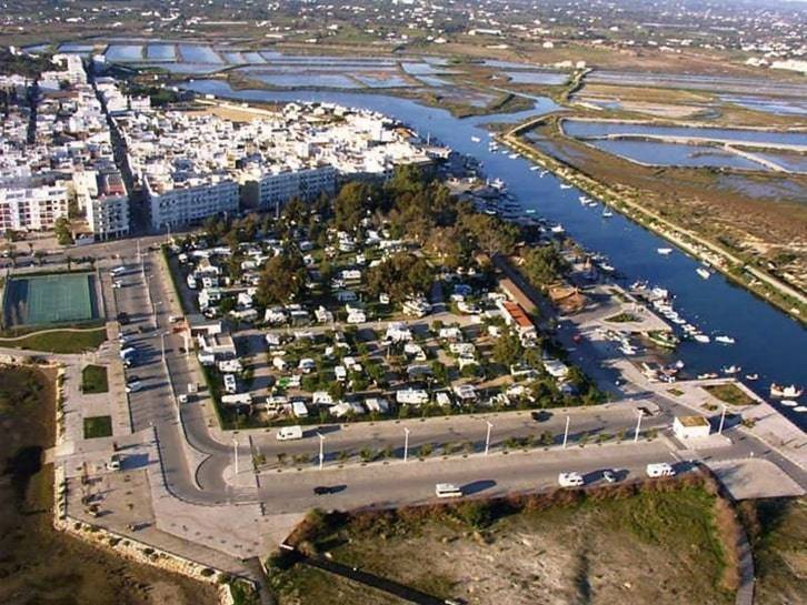 Calm sheltered lagoon water at Fuseta in the Ria Formosa, a paddleboarding launch spot near Faro