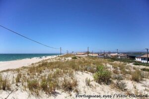 Small waves at Praia de Faro on the sheltered south coast of the Algarve