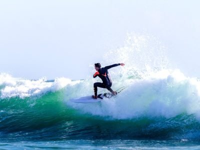Surfer riding a wave in the Algarve